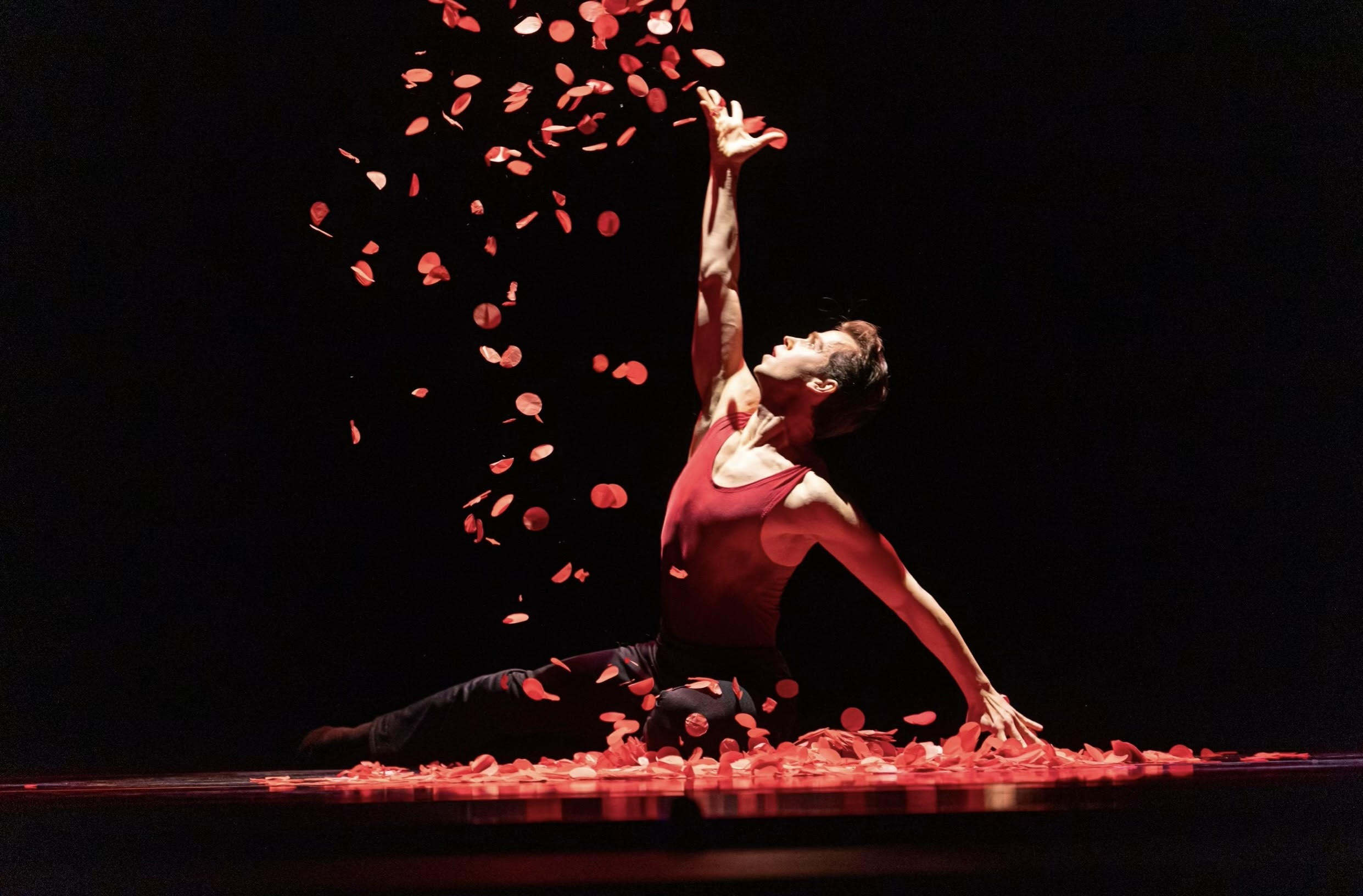 Marko Micov dancing on stage.