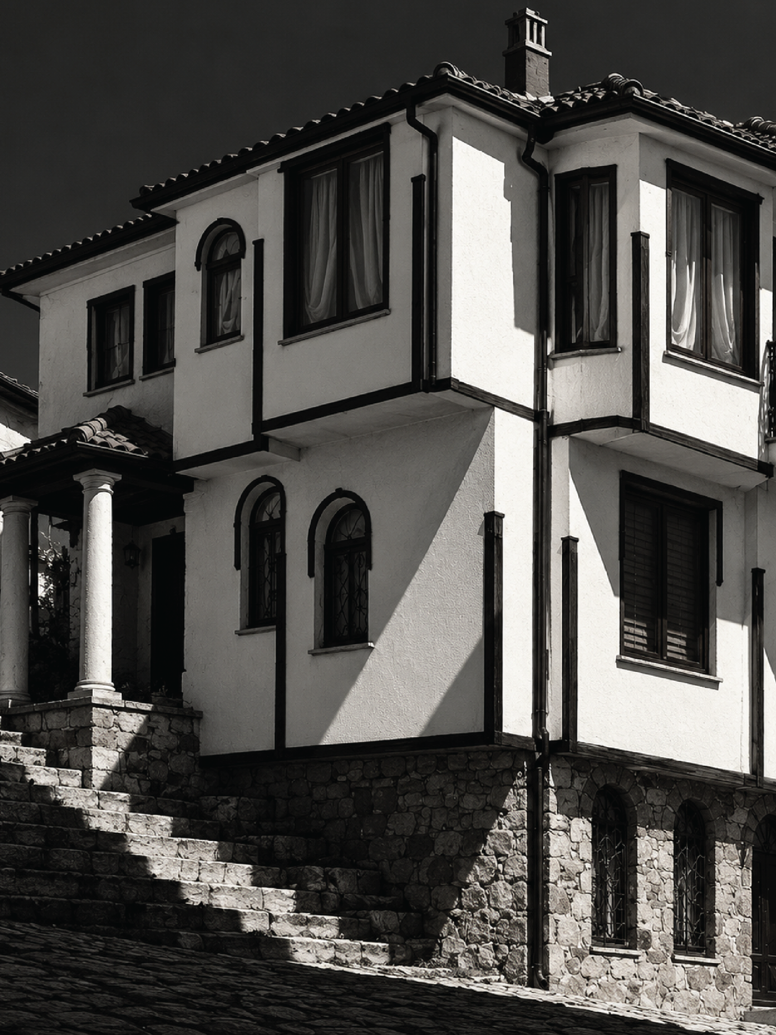 Watercolor illustration of a traditional Ohrid house with a red tile roof and stone base.