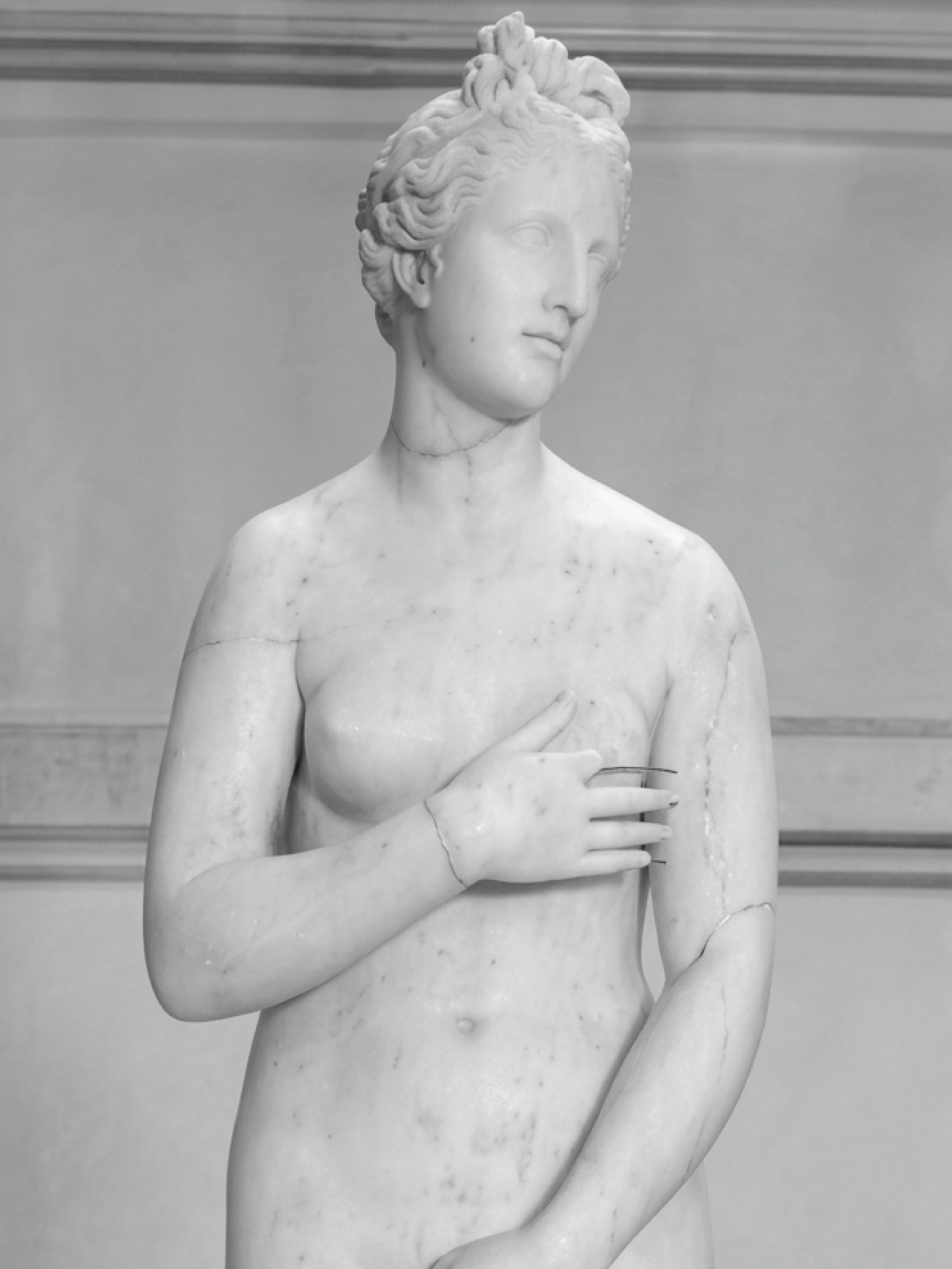 Full-length view of a Venus Pudica sculpture.