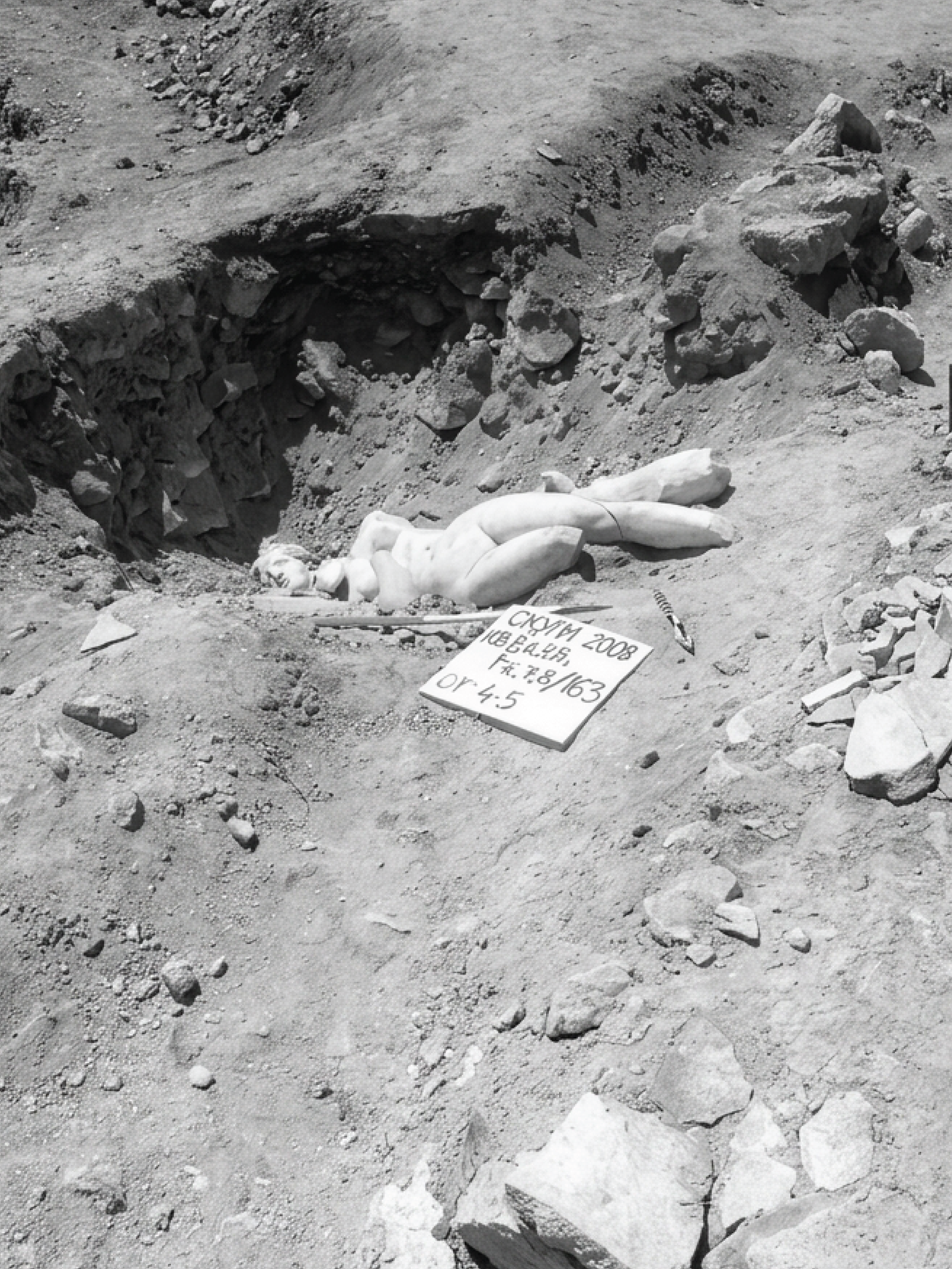 Wider excavation view of the Venus of Skupi in situ.