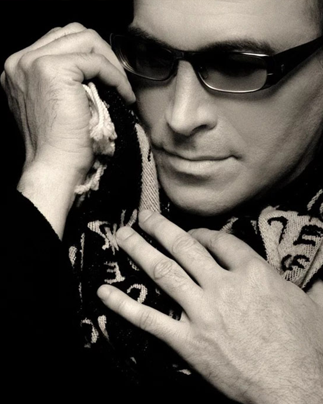 Black-and-white portrait of Vlado Janevski wearing sunglasses